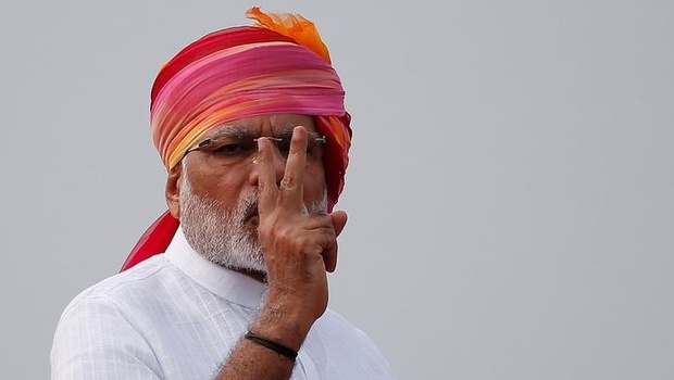 Prime Minister Narendra Modi gestures as he addresses the nation from the historic Red Fort during Independence Day celebrations in Delhi