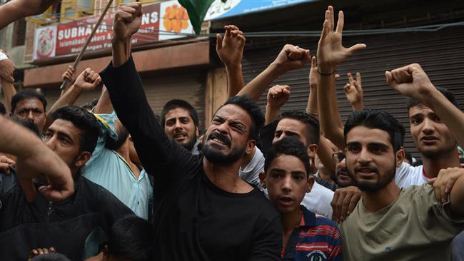 Protesters chant anti India slogans during a protest in downtown Srinagar Kashmir