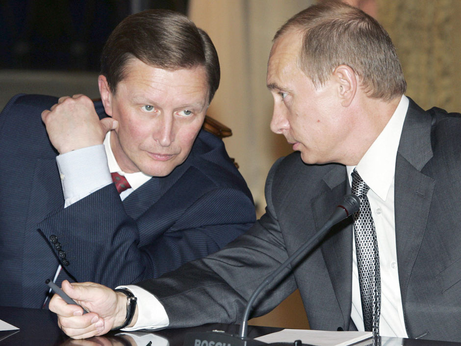 Russian President Vladimir Putin speaks with first Vice Premier Sergei Ivanov during a State Council session on 29 June 2007