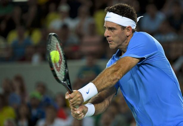 Juan Martin Del Potro in action against Novak Djokovic