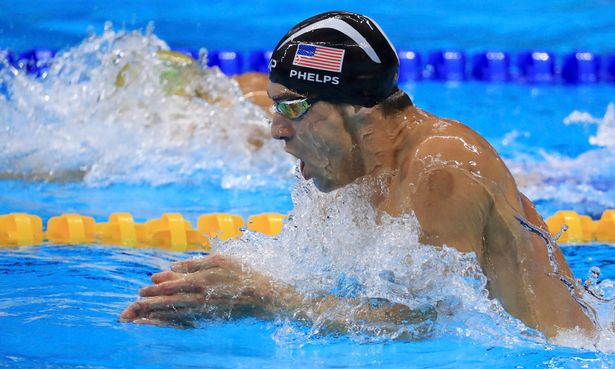 Michael Phelps competes on the way to winning the gold medal