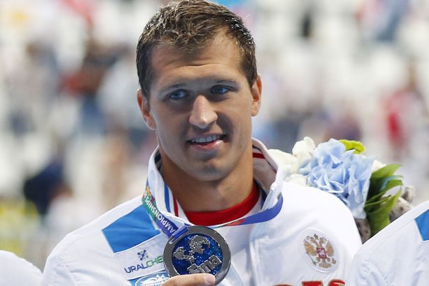 Nikita Lobintsev poses with his silver medal after the men's 4 x100m freestyle relay final