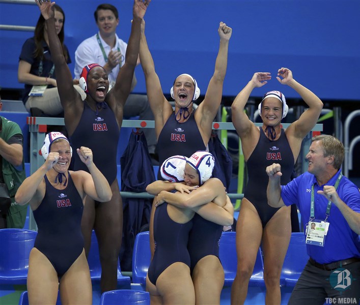 REUTERS   Team USA members celebrate their victory over Italy in the women’s water polo final