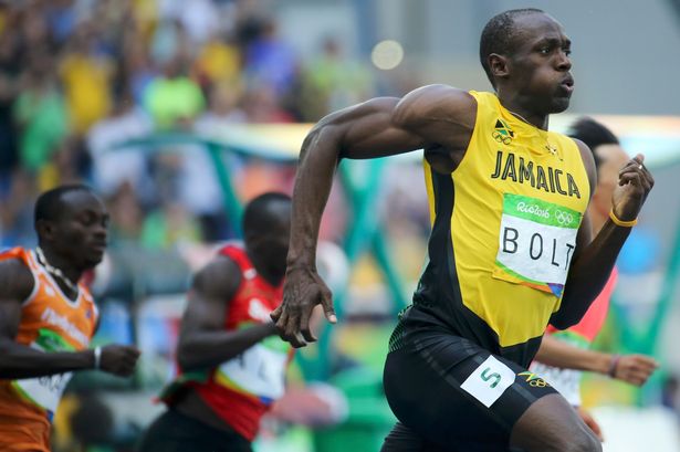 Usain Bolt of Jamaica competes