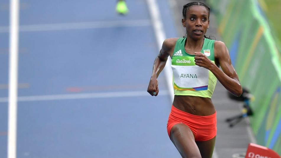 Almaz Ayana of Ethiopia sets world record in women's 10,000-meter race finishing in 29 minutes 17.45 seconds