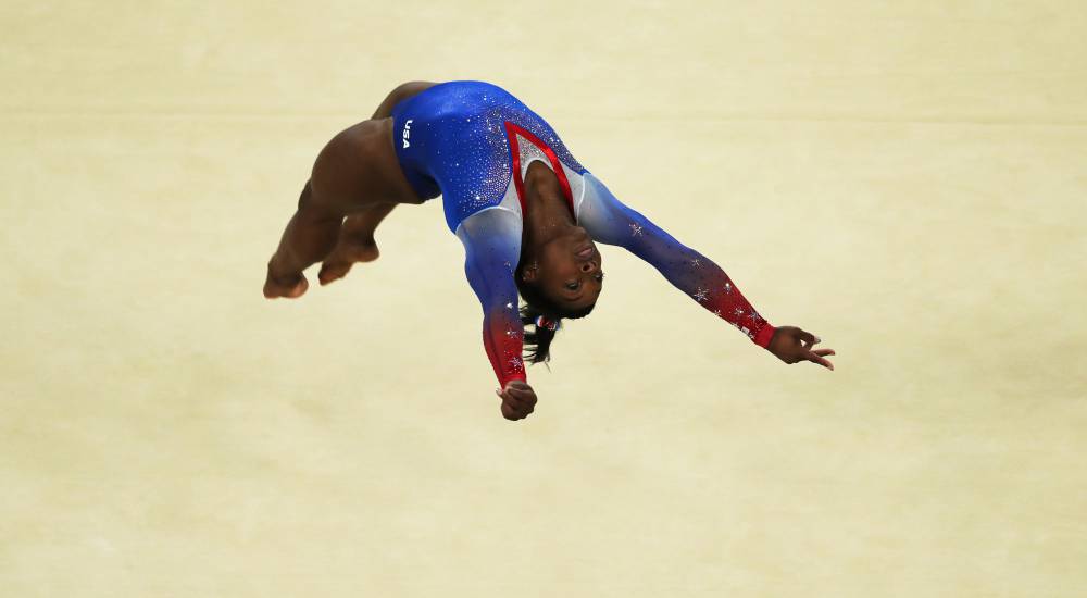 Biles four-gold gymnast to carry US flag at Rio closing ceremony