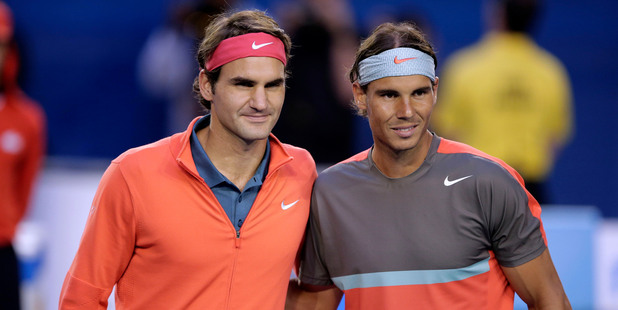 Rafael Nadal and Roger Federer pose at the net before their semifinal at the Australian Open