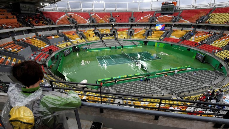 Rain forced the postponement of the tennis schedule in Rio