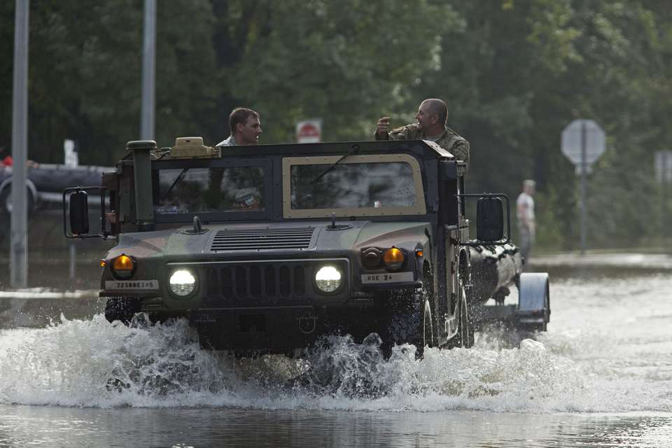 Rains wreak havoc on Louisiana 3 dead thousands evacuated