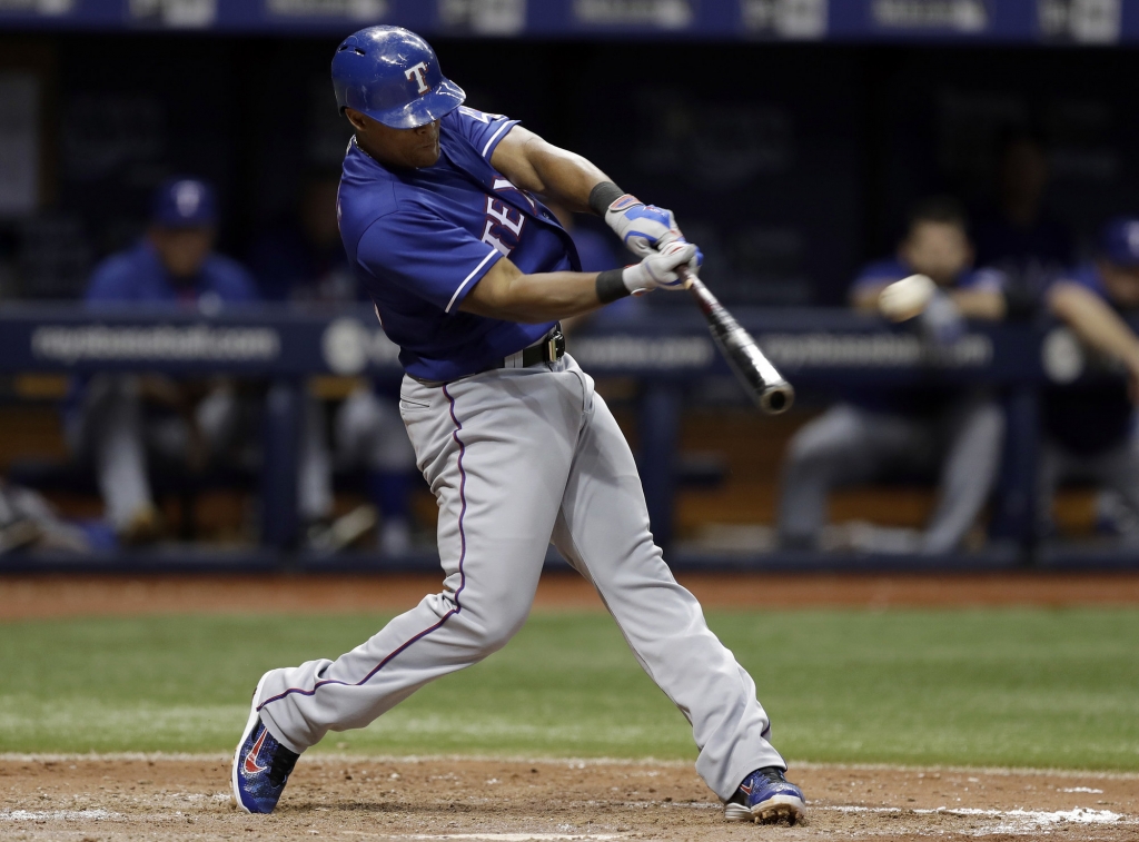 Texas Rangers&apos Adrian Beltre connects for a home run off Tampa Bay Rays relief pitcher Ryan Garton during the seventh inning of a baseball game Friday Aug. 19 2016 in St. Petersburg Fla