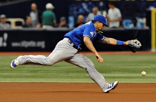 Kansas City Royals third baseman Cheslor Cuthbert misplays a ground ball hit by Tampa Bay Rays&#39 Steven Souza Jr. for an error during the seventh inning of a baseball game Thursday Aug. 4 2016 in St. Petersburg Fla