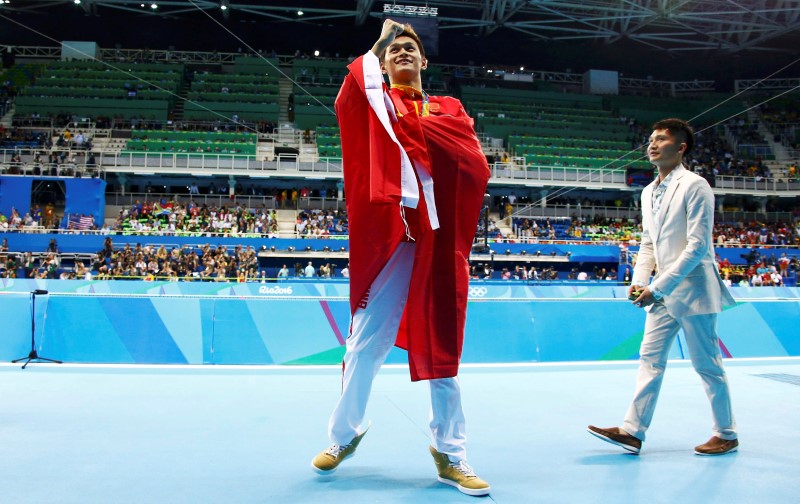 2016 Rio Olympics- Swimming- Victory Ceremony- Men's 200m Freestyle Victory Ceremony- Olympic Aquatics Stadium- Rio de Janeiro Brazil- 08/08/2016. Sun Yang of China celebrates with his gold medal. REUTERS  David Gray