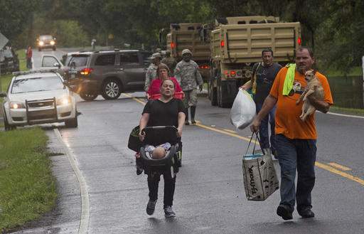 3 killed, thousands rescued in southeast Louisiana floods