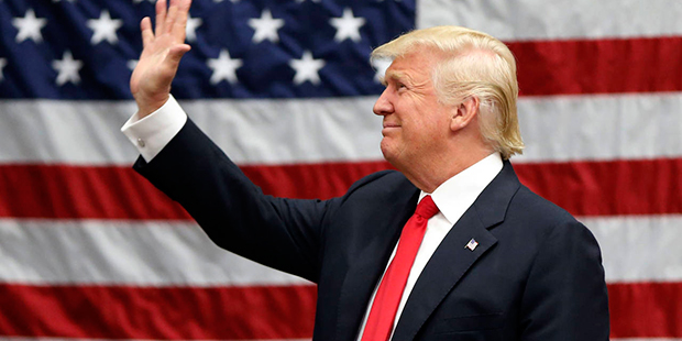 Republican presidential candidate Donald Trump and Russian President Vladimir Putin in the uniform of a Russian Navy officer