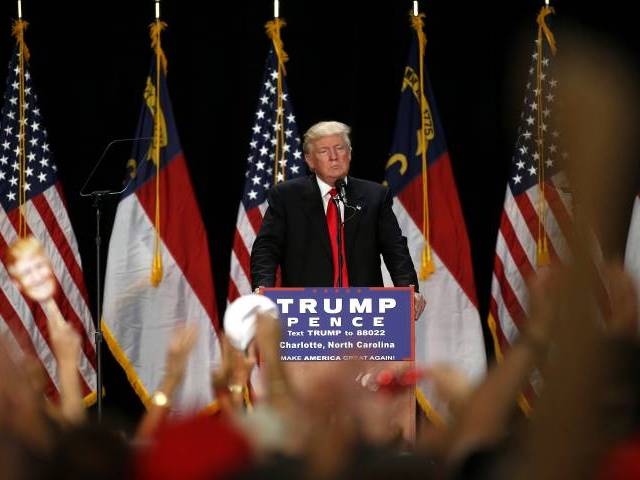 Republican presidential candidate Donald Trump speaks to supporters at a rally