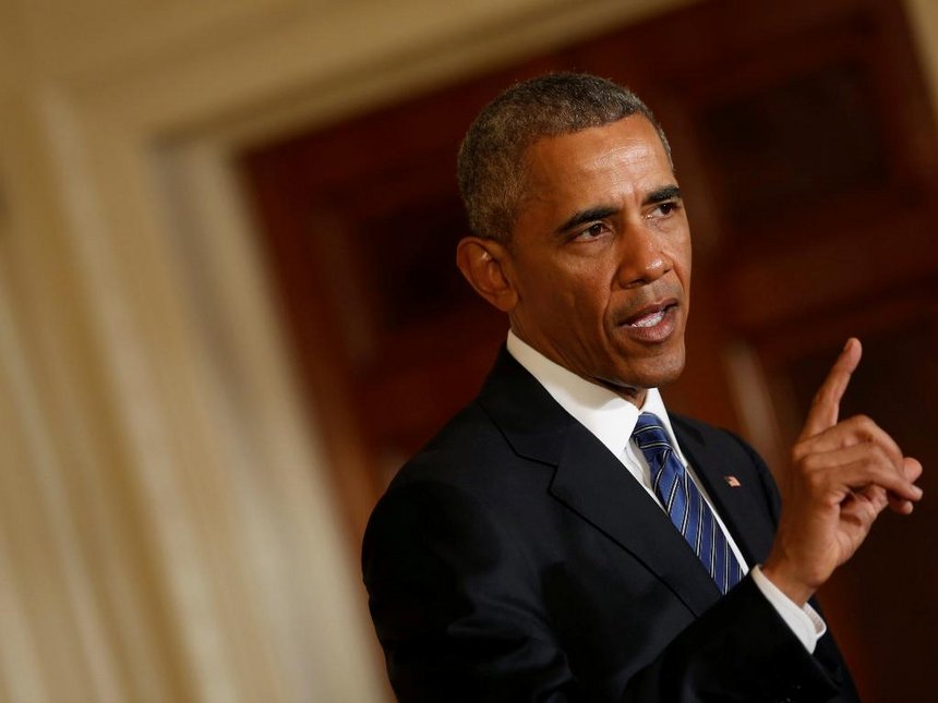 US President Barack Obama answers a question as he and Singapore's Prime Minister Lee Hsien Loong hold a joint news conference at the White House in Washington US