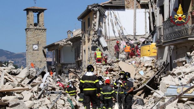 Rescuers work amid collapsed building in Amatrice