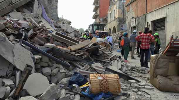 Rescuers work following an earthquake that hit Amatrice central Italy