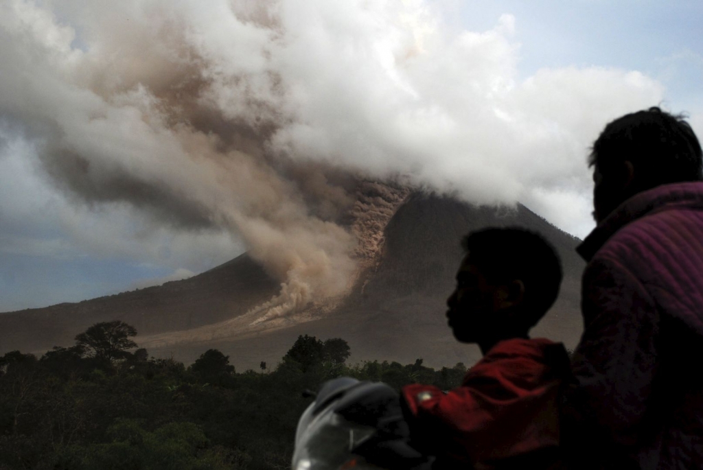 Three Indonesian volcanoes erupt flights disrupted again