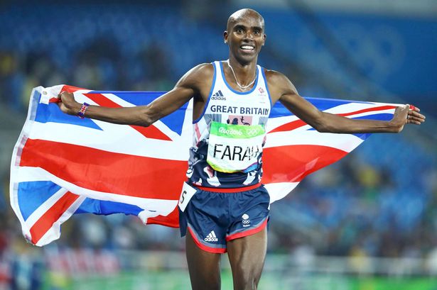 Mo Farah of Britain celebrates winning the gold