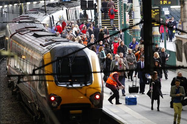 People walk on a platform