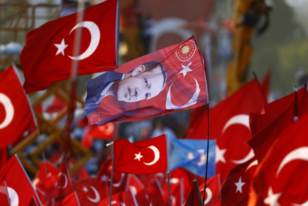 Tayyip Erdogan is seen during a rally to protest against last month's failed military coup attempt