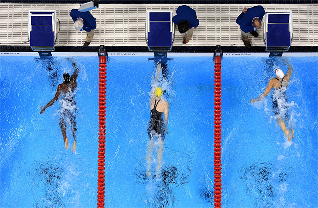 Richard Heathcote  Getty   The moment Manuel and Penny Oleksiak of Canada tie for the gold medal in the Women's 100m Freestyle Final