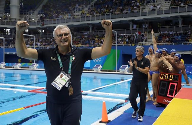 Italy's coach Alessandro Campagna celebrates with his players their victory during men's bronze medal water polo match against Montenegro at the 2016 Summer Olympics in Rio de Janeiro Brazil Saturday Aug. 20 2016