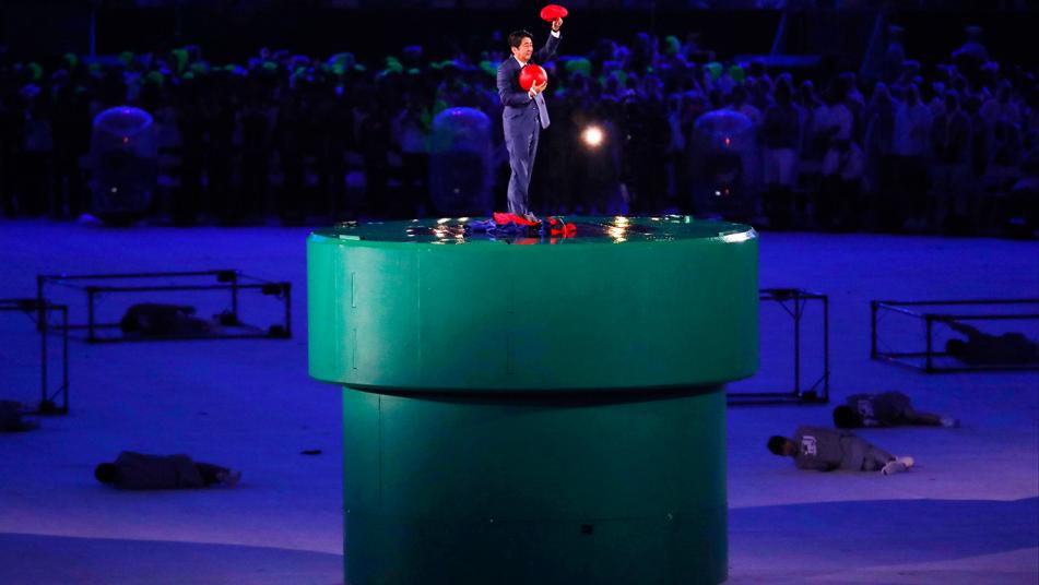 Japan's Prime Minister Shinzo Abe transports from Tokyo as Super Mario