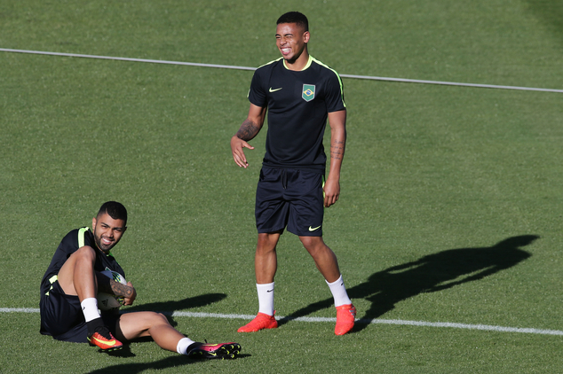 Brazil's Gabriel Barbosa left and Gabriel Jesus take part in a Brazil Olympic soccer team training session in Brasilia Brazil Aug. 2 2016. Brazil holds