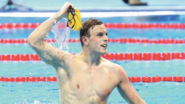 Australia’s Kyle Chalmers reacts after winning the 100m freestyle race