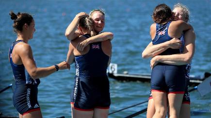 Great Britain celebrate after winning the silver medal in the women's eight at Rio 2016