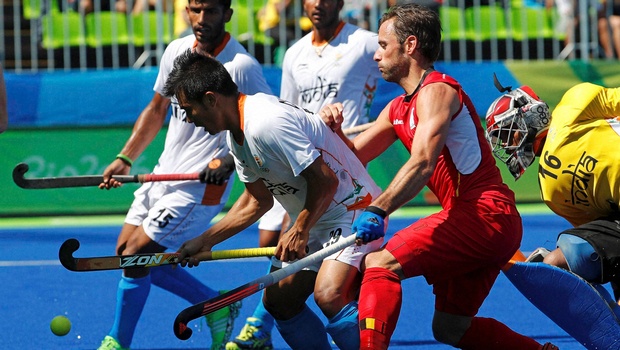 Belgium's Sebastian Dockier second from right tries to score past the defense of India during a men's field hockey quarter final match atthe 2016 Summer Olympics in Rio de Janeiro Brazil Sunday Aug. 14 2016. | AP