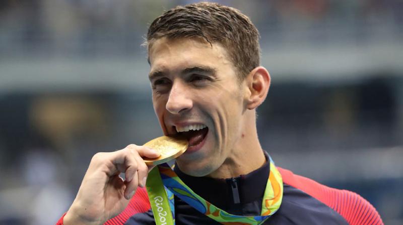 In an unforgettable display of Olympic power Michael Phelps won two more finals to take his historic all-time record load to 21 golds and entrench his legendary status