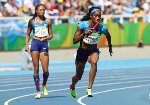 United States Allyson Felix left looks on as English Gardner runs with the baton that was dropped in a women's 4x100-meter relay heat during the athletics competitions of the 2016 Summer Olympics at the Olympic stadium in Rio de Janeiro Brazil Thursd