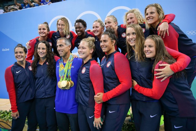 Former UCLA women's and men's water polo coach Adam Krikorian got to wear all 13 of his athletes&#039 medals after USA beat Italy 12-5