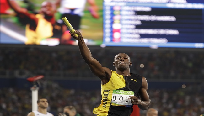 Jamaica's Usain Bolt celebrates winning the gold medal in the men's 4x100-meter relay final during the athletics competitions of the 2016 Summer Olympics at the Olympic stadium in Rio de Janeiro Brazil Friday Aug. 19 2016. (AP