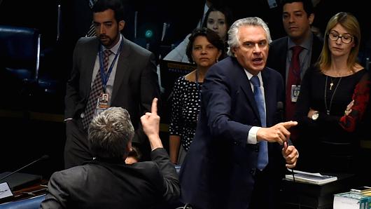 Senators Ronaldo Caiado and Lindbergh Farias exchange insults during the Senate impeachment trial of Brazilian suspended President Dilma Rousseff at the National Congress in Brasilia