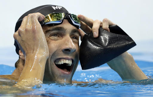 United States Michael Phelps reacts after the men's 100-meter butterfly final during the swimming competitions at the 2016 Summer Olympics Friday Aug. 12 2016 in Rio de Janeiro Brazil