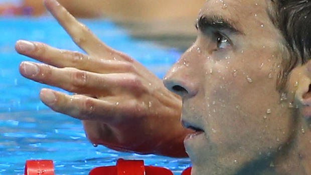 Michael Phelps' Son Boomer Steals the Show Again As Phelps Wins 20th Gold Medal — See Boomer's Own Game Face!