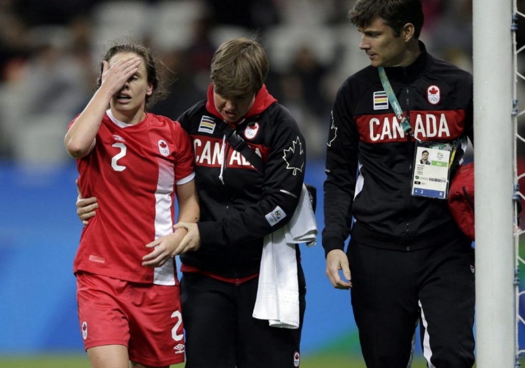 Canada's Allysha Chapman leaves the pitch after being injured during a quarter-final match of the women's Olympic football tournament between Canada and France in Sao Paulo Brazil Friday Aug. 12 2016