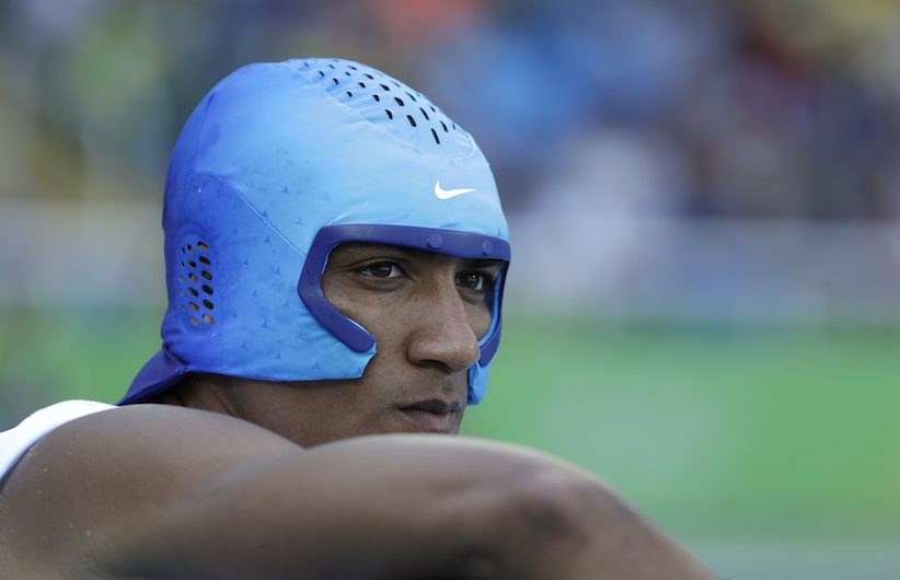 United States Ashton Eaton wears a cooling cap during the shot put of the decathlon during the athletics competitions of the 2016 Summer Olympics at the Olympic stadium in Rio de Janeiro Brazil Wednesday Aug. 17 2016