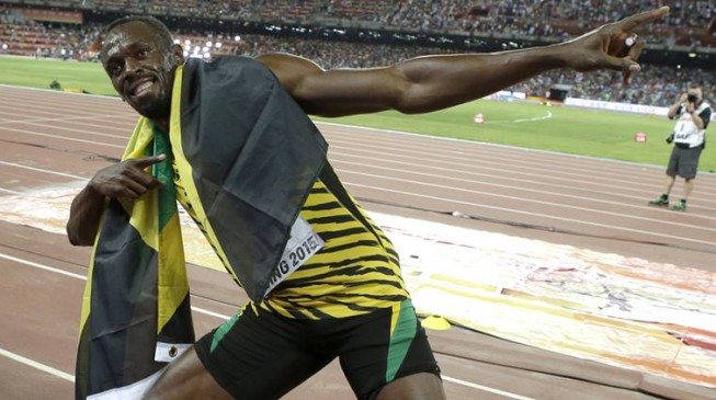 Usain Bolt storms to 100m Olympics treble win