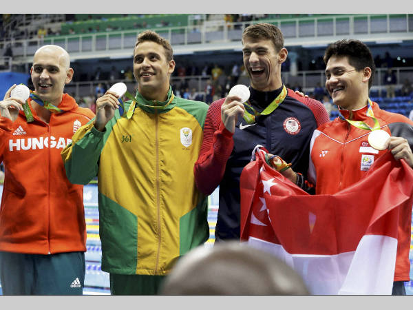 From left Silver medal winners Laszlo Cseh Chad Le Clos Michael Phelps and gold medallist Joseph Schooling after the 100m butterfly event at Rio Olympics