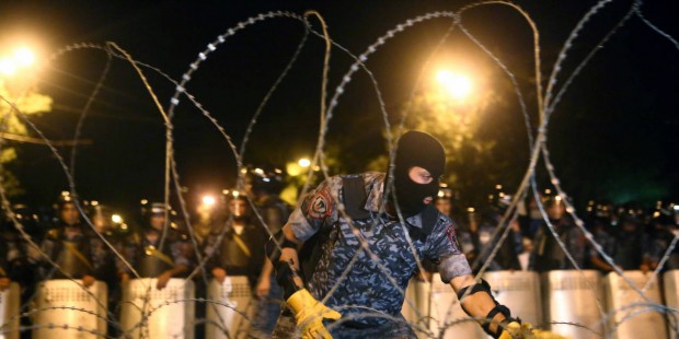 Police, protestors clash as Armenia standoff continues