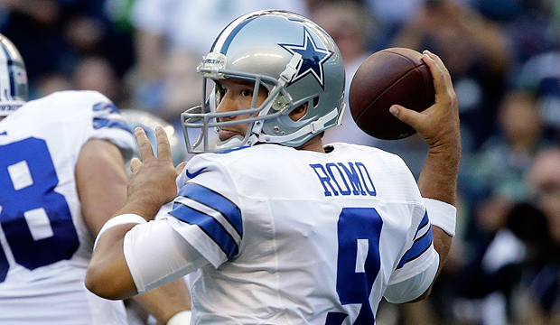 Cowboys' Romo leaves after getting pulled down awkwardly