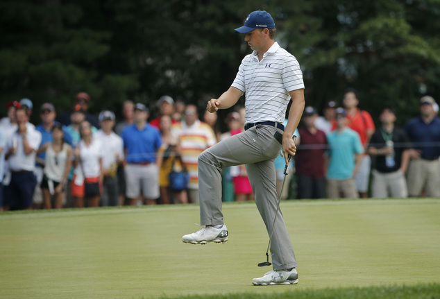 Jordan Spieth reacts to missing a putt on the first hole during the third round of the PGA Championship golf tournament at Baltusrol Golf Club in Springfield