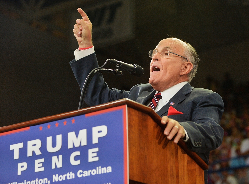 WILMINGTON NC- AUGUST 9  Former New York City Mayor Rudy Giuliani introduces speaks the crowd before introducing Republican presidential candidate Donald Trump during a campaign event at Trask Coliseum