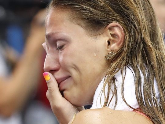 Russia's Yulia Efimova cries after she placed second in the 100 breaststroke