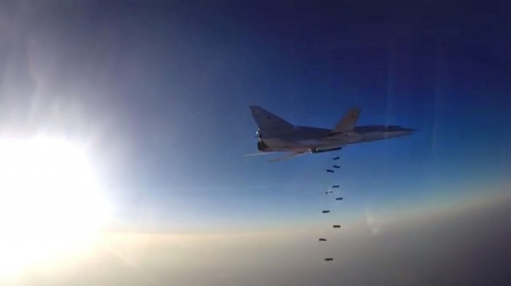 This video grab reportedly shows a Russian bomber Tupolev Tu-22 M3 conducting an airstrike on Syria. Iran's acknowledgement that Russia is using its territory could rile U.S.-allied Gulf neighbours strengthen Syrian President Bashar Assad and impact